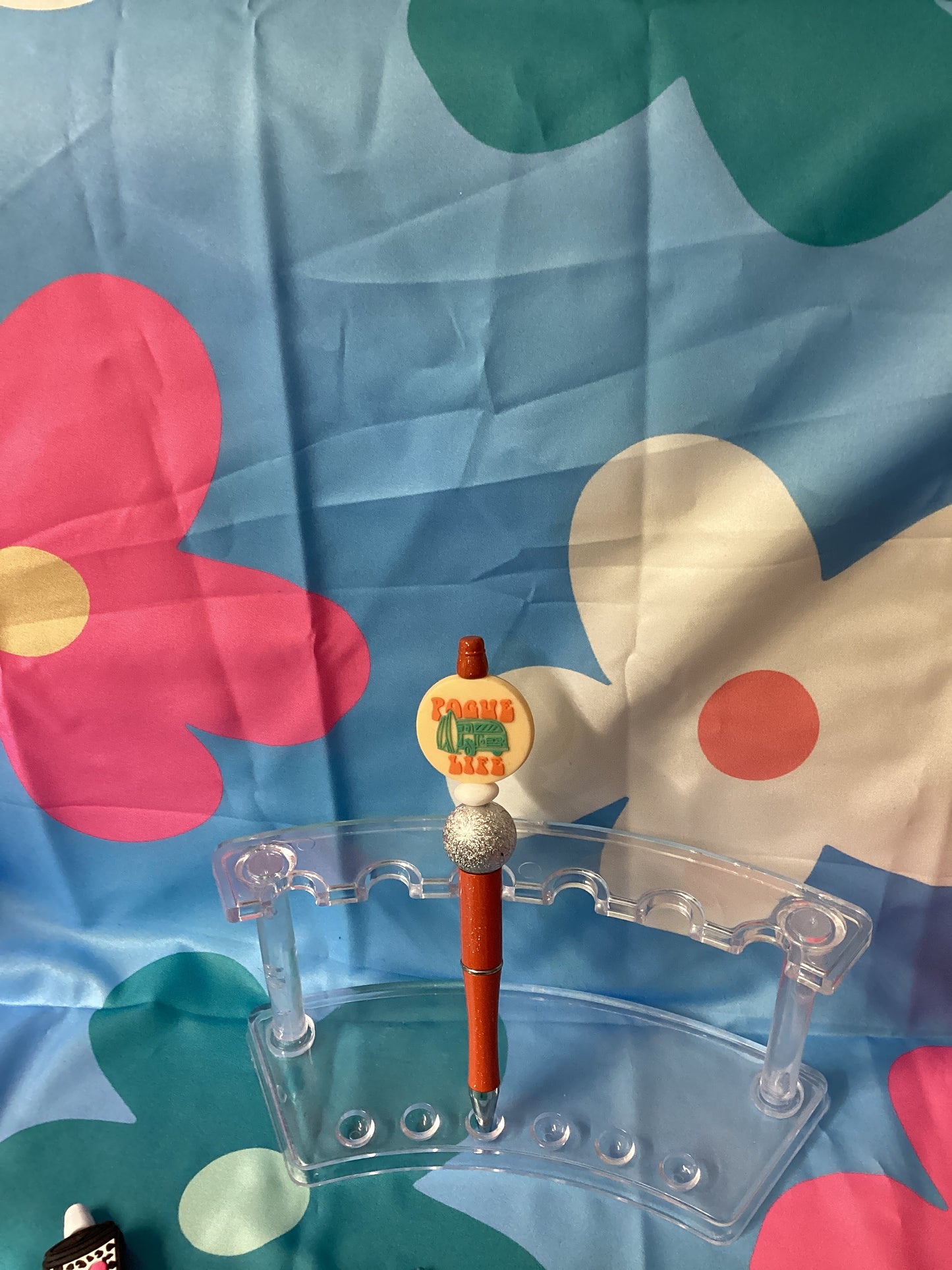 Pogue life orange beaded pen