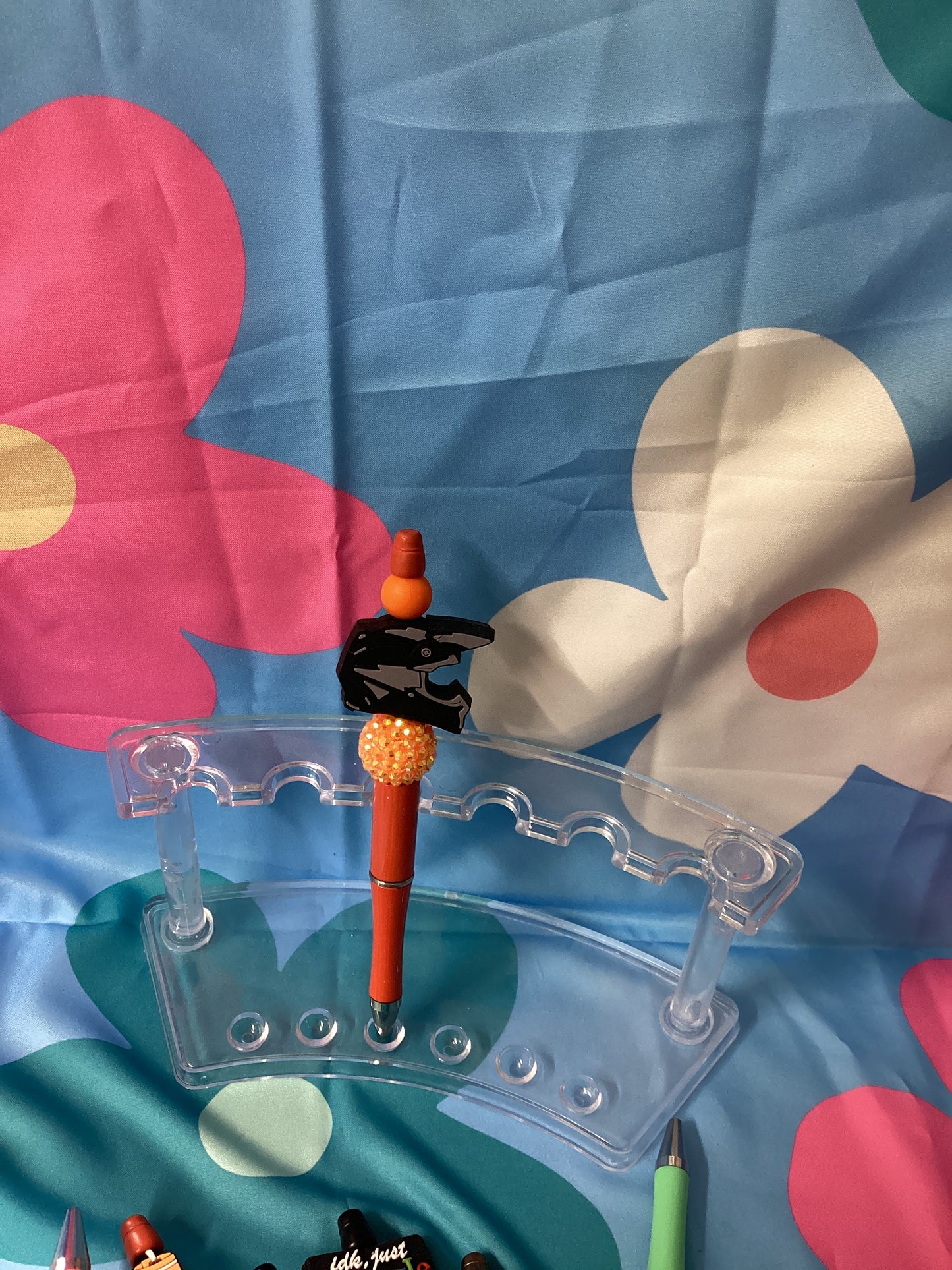 Orange helmet beaded pen